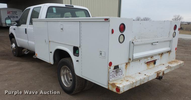 image for item DB0677 2007 Ford F350 Super Duty Crew Cab utility bed pickup truck