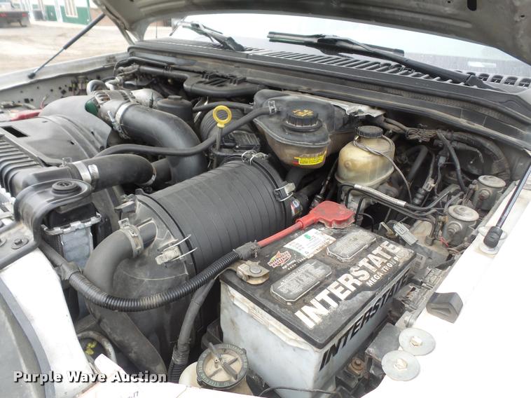 image for item DB0677 2007 Ford F350 Super Duty Crew Cab utility bed pickup truck