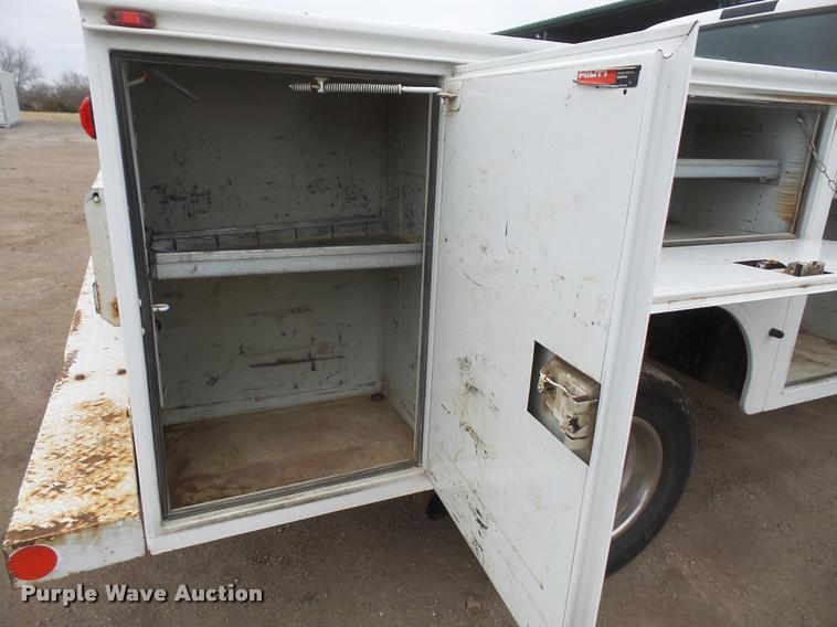 image for item DB0677 2007 Ford F350 Super Duty Crew Cab utility bed pickup truck