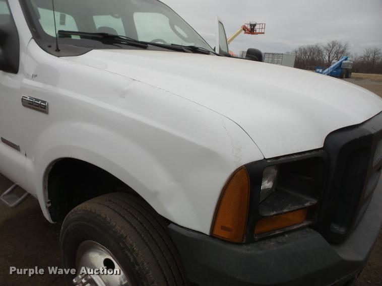 image for item DB0677 2007 Ford F350 Super Duty Crew Cab utility bed pickup truck