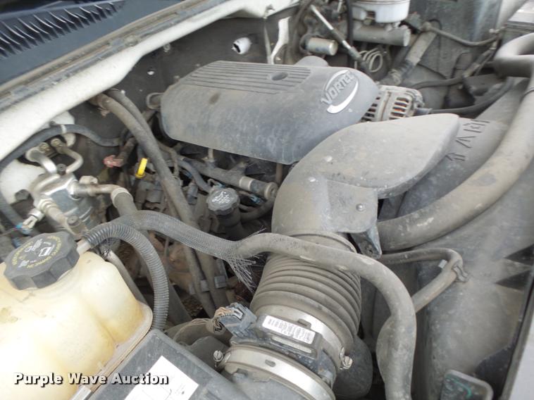 image for item DB1268 2006 Chevrolet Silverado 3500 flatbed pickup truck