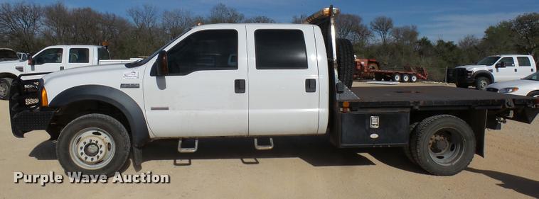 image for item DB2439 2007 Ford F550 Super Duty XL Crew Cab flatbed truck