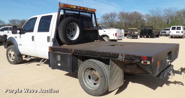 image for item DB2439 2007 Ford F550 Super Duty XL Crew Cab flatbed truck