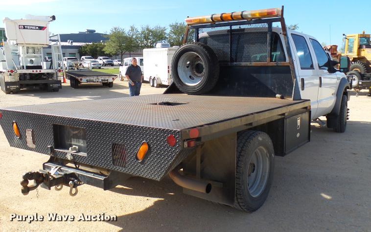 image for item DB2439 2007 Ford F550 Super Duty XL Crew Cab flatbed truck