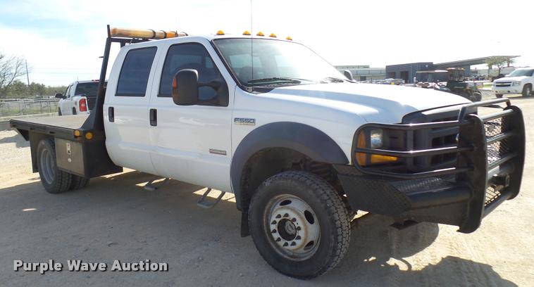 image for item DB2439 2007 Ford F550 Super Duty XL Crew Cab flatbed truck