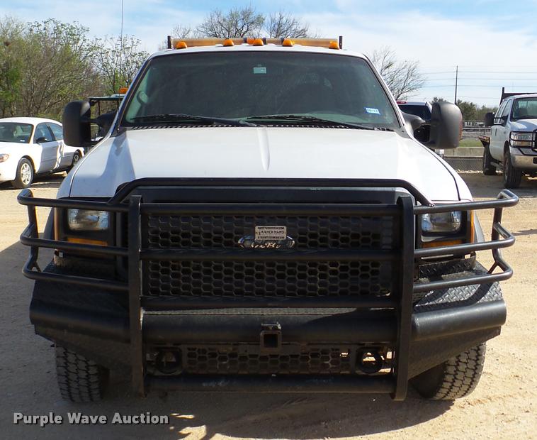 image for item DB2439 2007 Ford F550 Super Duty XL Crew Cab flatbed truck