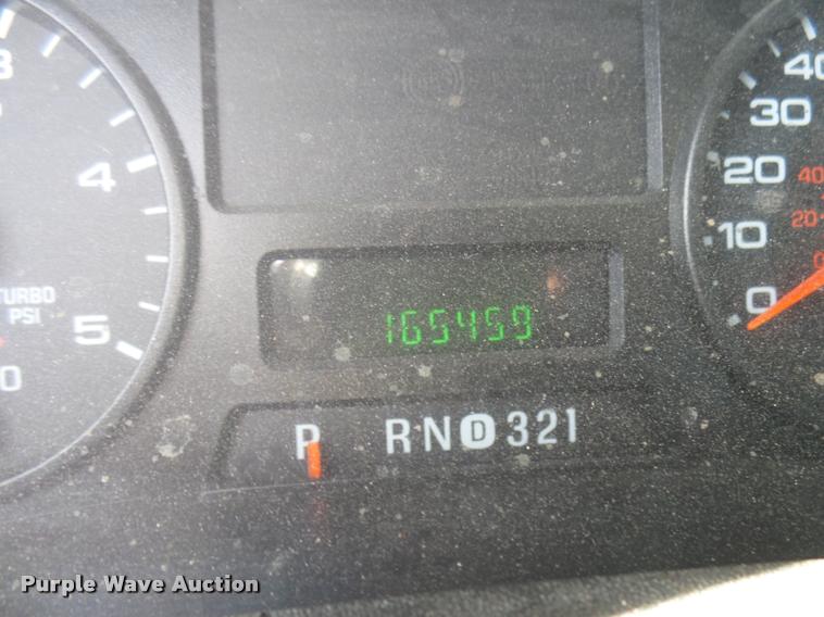 image for item DB2439 2007 Ford F550 Super Duty XL Crew Cab flatbed truck