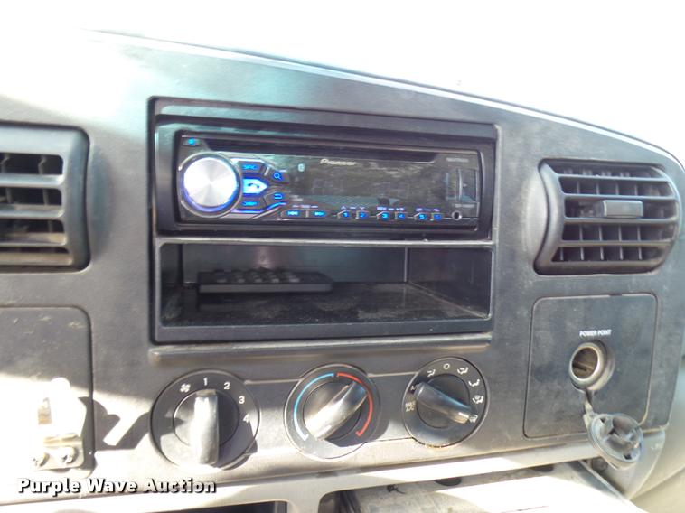 image for item DB2439 2007 Ford F550 Super Duty XL Crew Cab flatbed truck