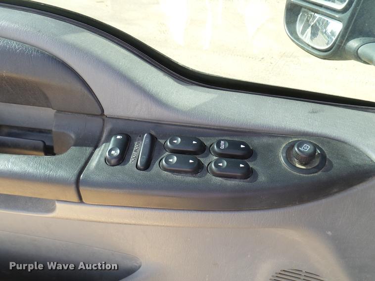 image for item DB2439 2007 Ford F550 Super Duty XL Crew Cab flatbed truck