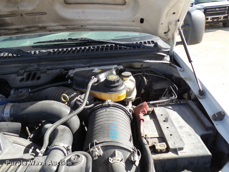 image for item DB2439 2007 Ford F550 Super Duty XL Crew Cab flatbed truck