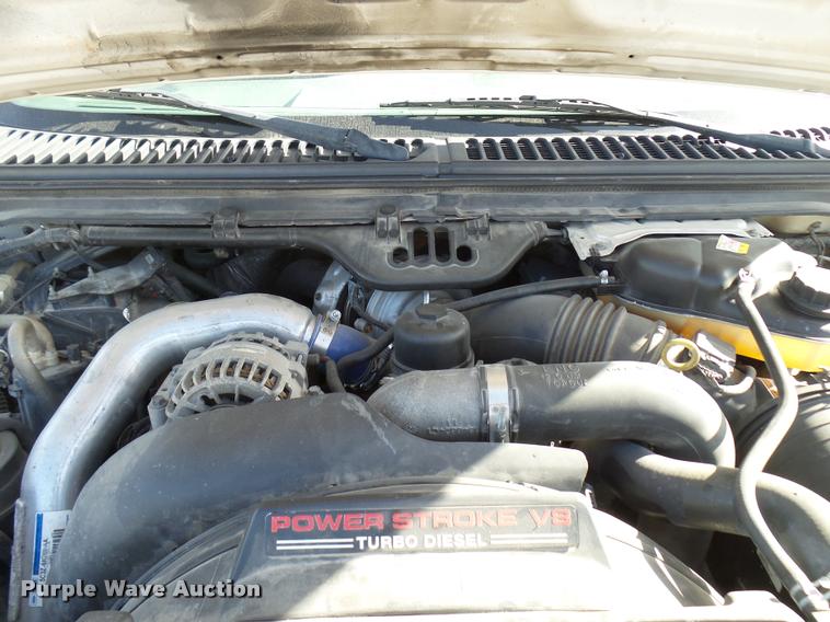 image for item DB2439 2007 Ford F550 Super Duty XL Crew Cab flatbed truck