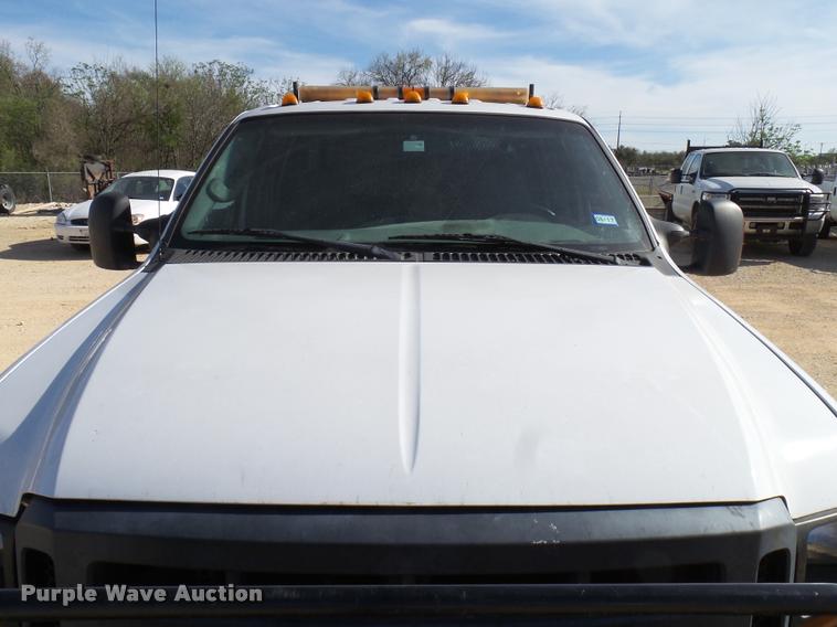 image for item DB2439 2007 Ford F550 Super Duty XL Crew Cab flatbed truck