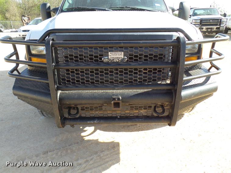 image for item DB2439 2007 Ford F550 Super Duty XL Crew Cab flatbed truck