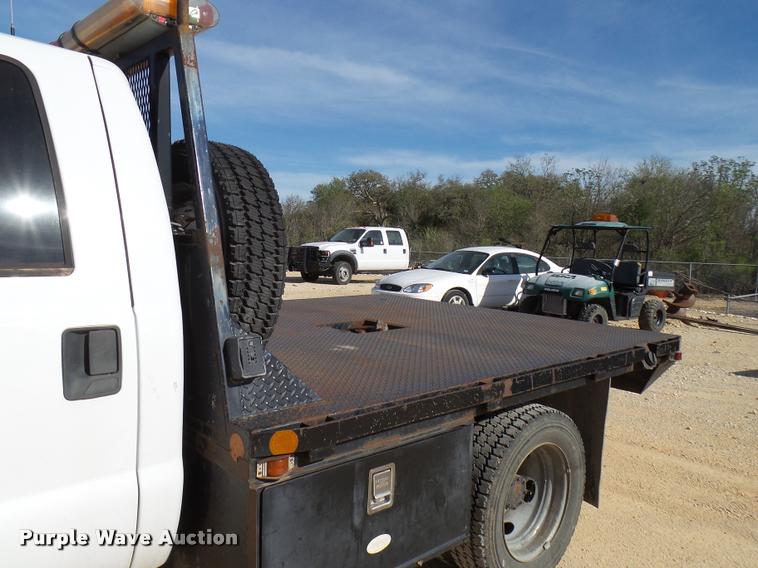 image for item DB2439 2007 Ford F550 Super Duty XL Crew Cab flatbed truck