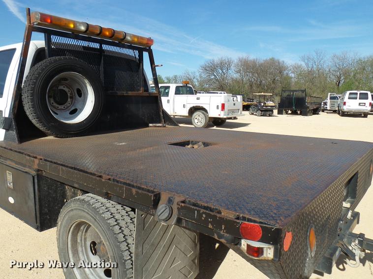 image for item DB2439 2007 Ford F550 Super Duty XL Crew Cab flatbed truck