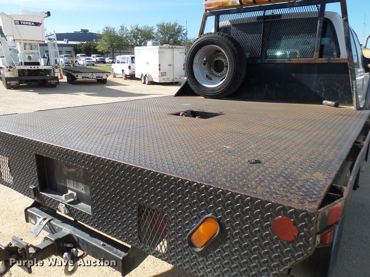 image for item DB2439 2007 Ford F550 Super Duty XL Crew Cab flatbed truck