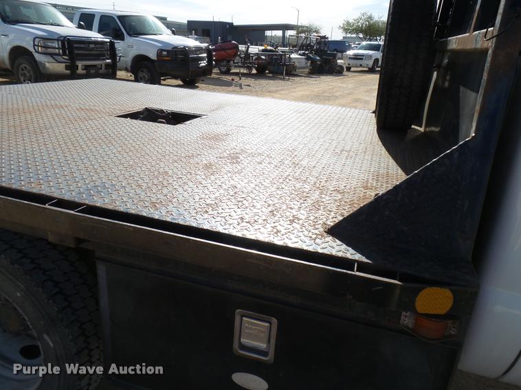 image for item DB2439 2007 Ford F550 Super Duty XL Crew Cab flatbed truck