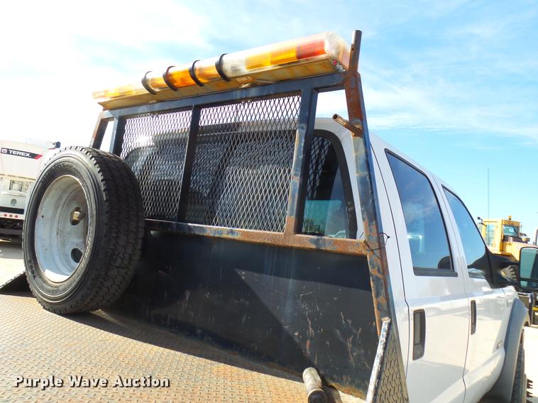 image for item DB2439 2007 Ford F550 Super Duty XL Crew Cab flatbed truck