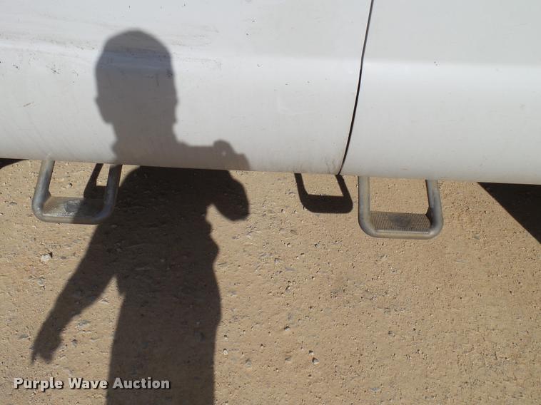 image for item DB2439 2007 Ford F550 Super Duty XL Crew Cab flatbed truck