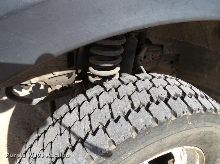 image for item DB2439 2007 Ford F550 Super Duty XL Crew Cab flatbed truck