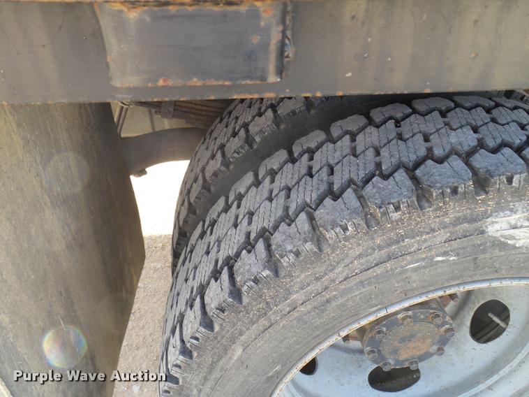 image for item DB2439 2007 Ford F550 Super Duty XL Crew Cab flatbed truck