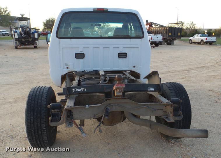 image for item DB2453 2004 Ford F350 Super Duty SuperCab pickup truck cab and chassis