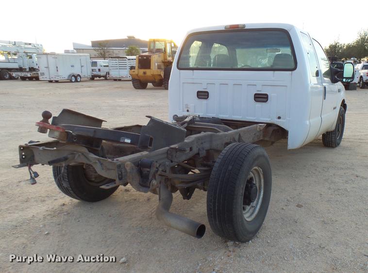 image for item DB2453 2004 Ford F350 Super Duty SuperCab pickup truck cab and chassis