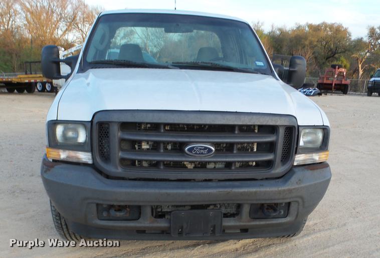 image for item DB2453 2004 Ford F350 Super Duty SuperCab pickup truck cab and chassis