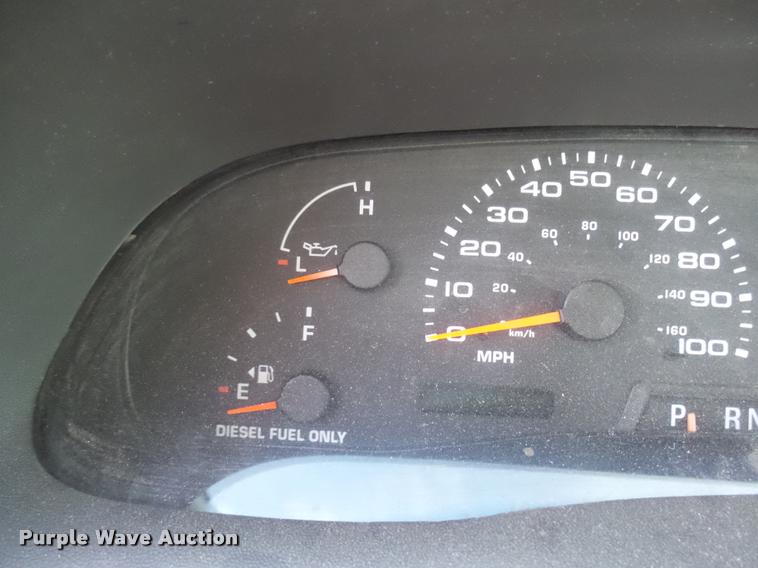 image for item DB2453 2004 Ford F350 Super Duty SuperCab pickup truck cab and chassis