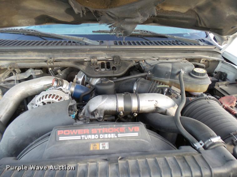 image for item DB2453 2004 Ford F350 Super Duty SuperCab pickup truck cab and chassis