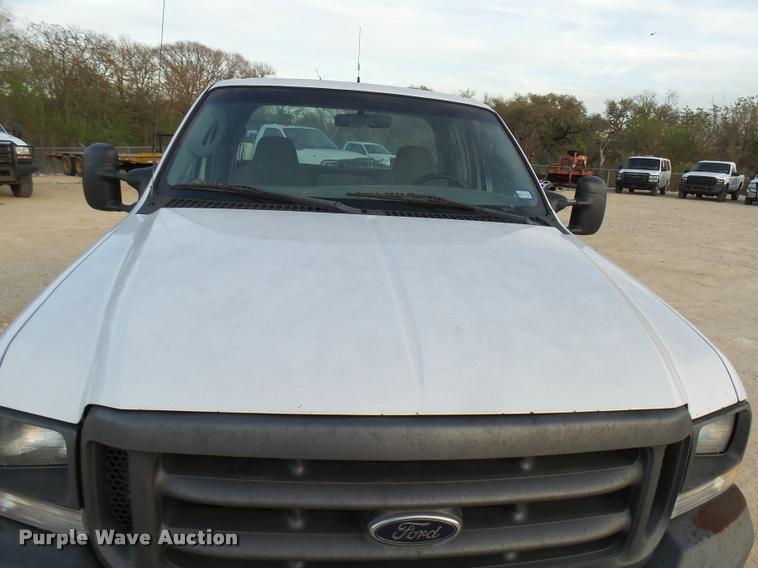 image for item DB2453 2004 Ford F350 Super Duty SuperCab pickup truck cab and chassis