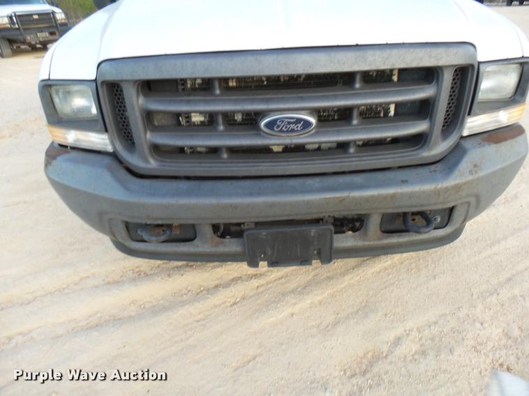 image for item DB2453 2004 Ford F350 Super Duty SuperCab pickup truck cab and chassis