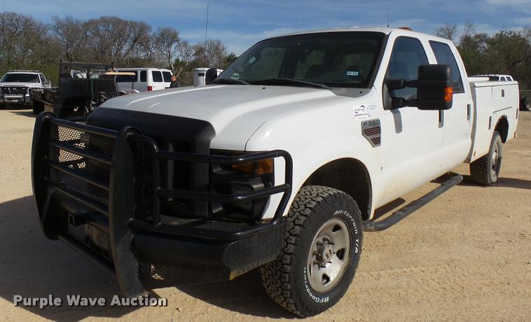 image for item DB2457 2008 Ford F350 Super Duty XL Crew Cab utility bed pickup truck