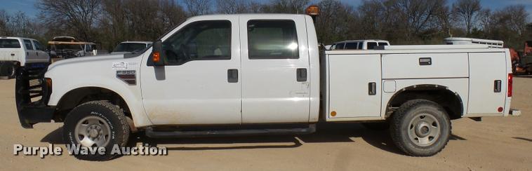image for item DB2457 2008 Ford F350 Super Duty XL Crew Cab utility bed pickup truck