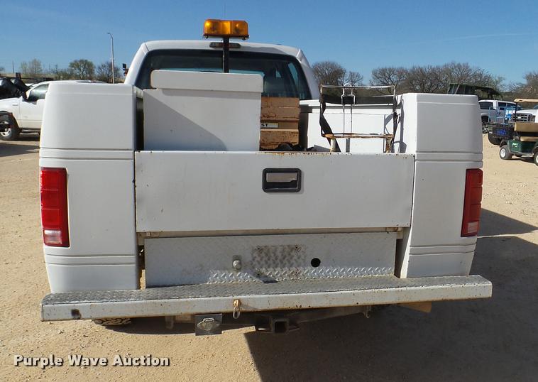 image for item DB2457 2008 Ford F350 Super Duty XL Crew Cab utility bed pickup truck