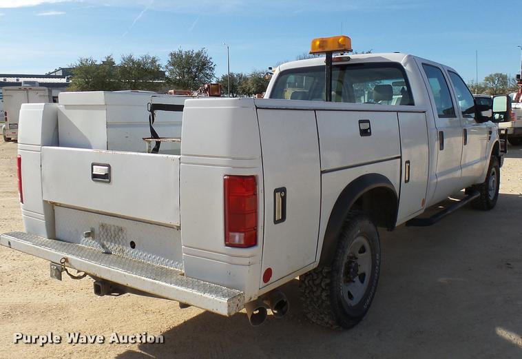 image for item DB2457 2008 Ford F350 Super Duty XL Crew Cab utility bed pickup truck