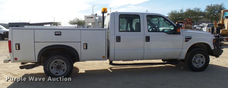 image for item DB2457 2008 Ford F350 Super Duty XL Crew Cab utility bed pickup truck