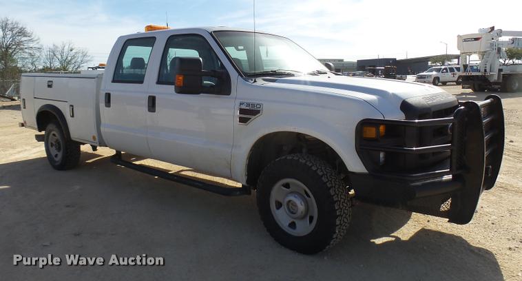 image for item DB2457 2008 Ford F350 Super Duty XL Crew Cab utility bed pickup truck