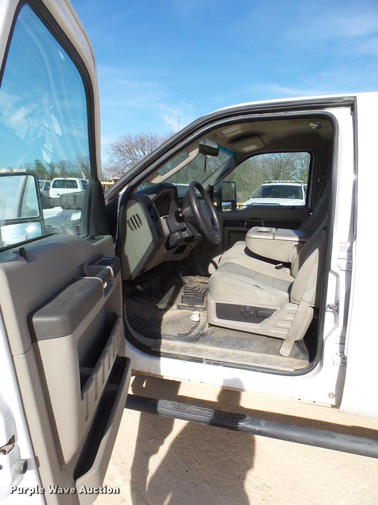 image for item DB2457 2008 Ford F350 Super Duty XL Crew Cab utility bed pickup truck