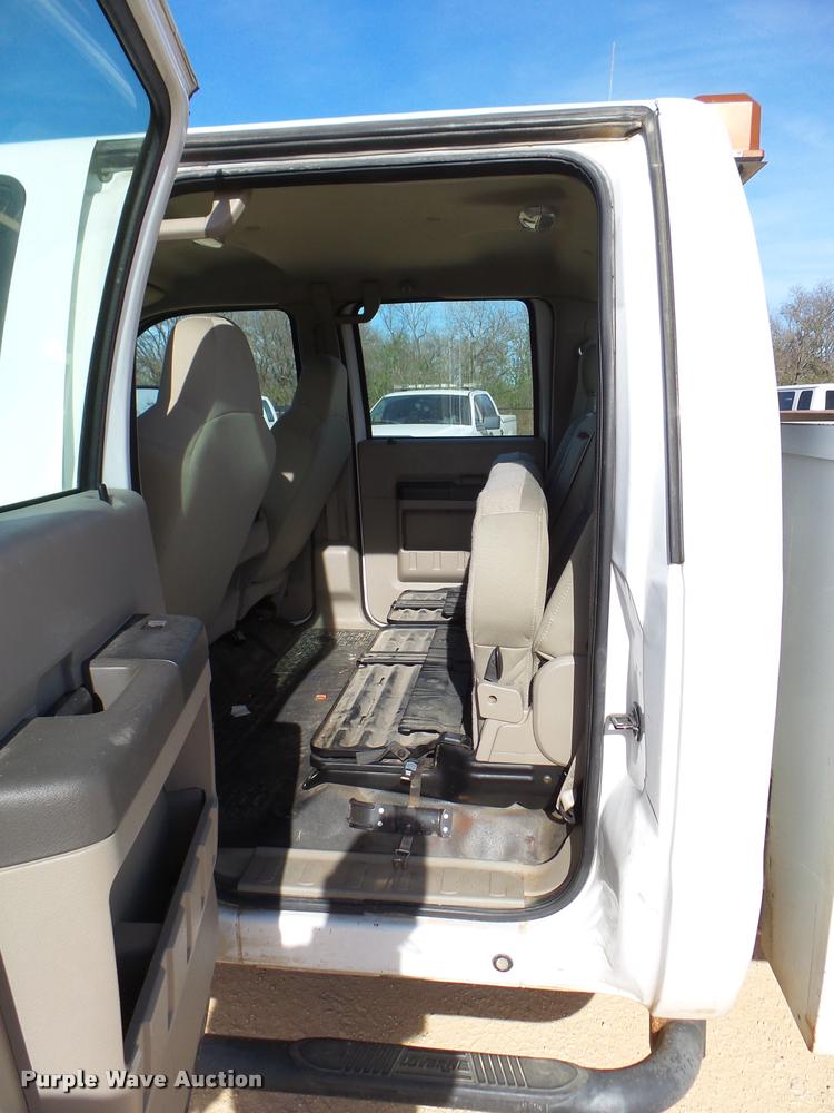 image for item DB2457 2008 Ford F350 Super Duty XL Crew Cab utility bed pickup truck