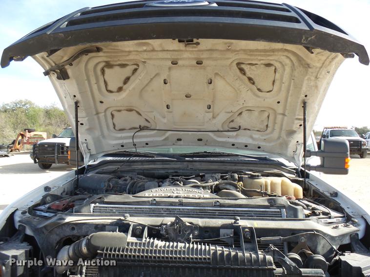 image for item DB2457 2008 Ford F350 Super Duty XL Crew Cab utility bed pickup truck