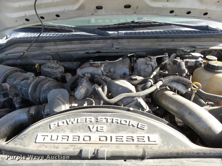 image for item DB2457 2008 Ford F350 Super Duty XL Crew Cab utility bed pickup truck