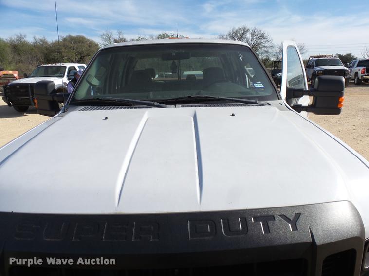 image for item DB2457 2008 Ford F350 Super Duty XL Crew Cab utility bed pickup truck