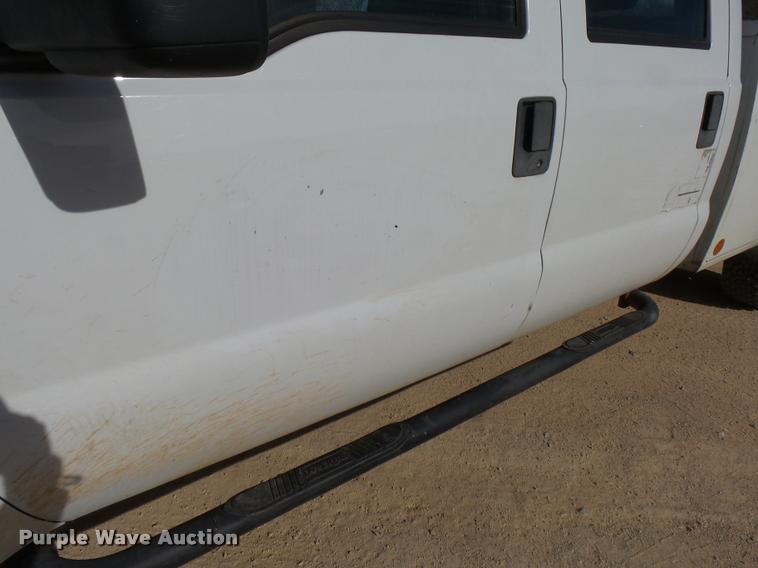 image for item DB2457 2008 Ford F350 Super Duty XL Crew Cab utility bed pickup truck