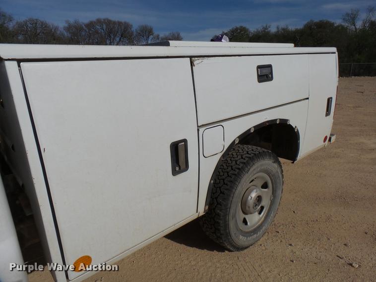 image for item DB2457 2008 Ford F350 Super Duty XL Crew Cab utility bed pickup truck