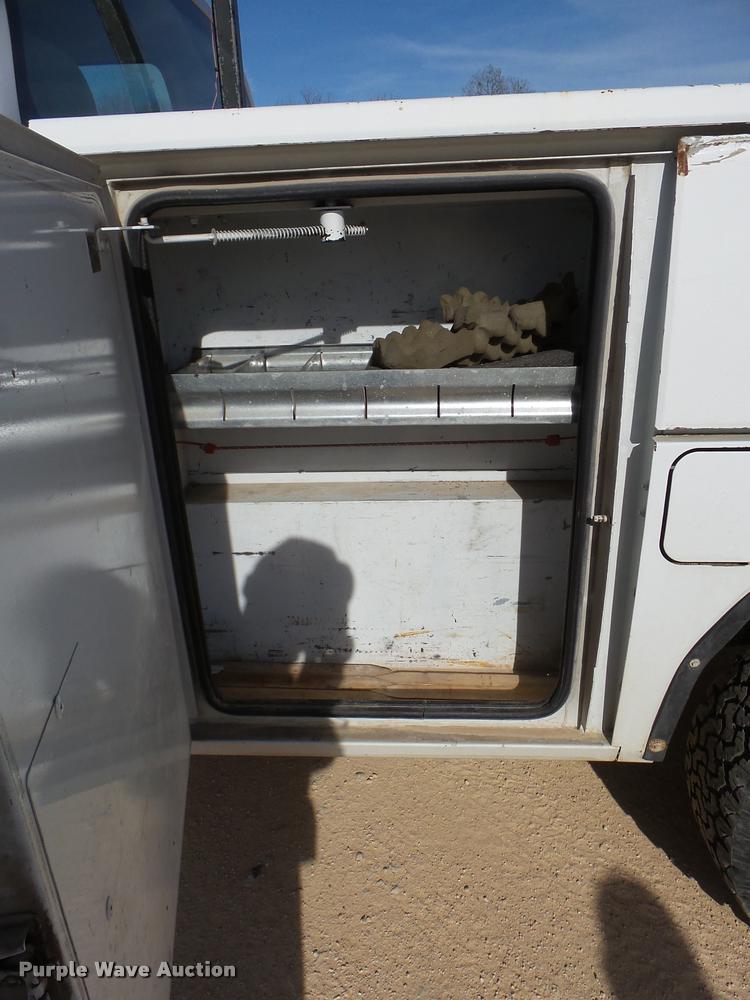 image for item DB2457 2008 Ford F350 Super Duty XL Crew Cab utility bed pickup truck