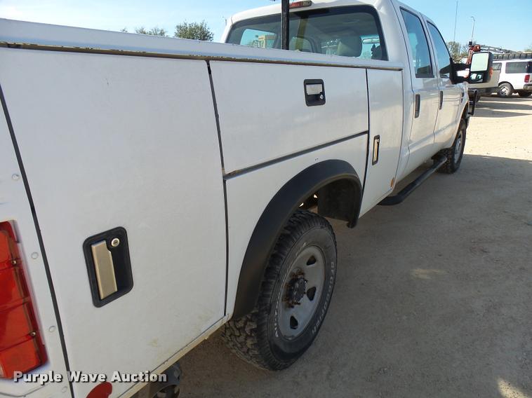 image for item DB2457 2008 Ford F350 Super Duty XL Crew Cab utility bed pickup truck