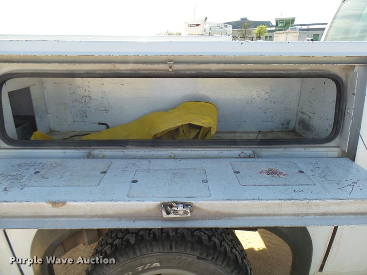 image for item DB2457 2008 Ford F350 Super Duty XL Crew Cab utility bed pickup truck