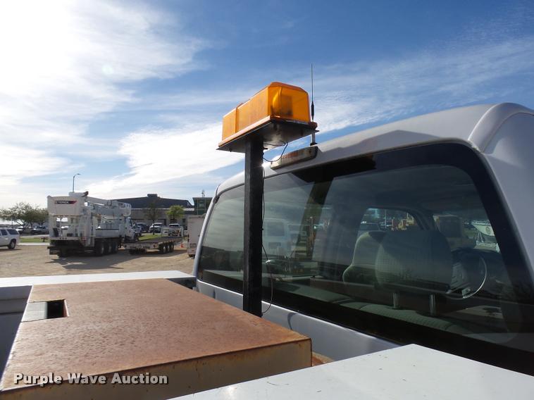 image for item DB2457 2008 Ford F350 Super Duty XL Crew Cab utility bed pickup truck