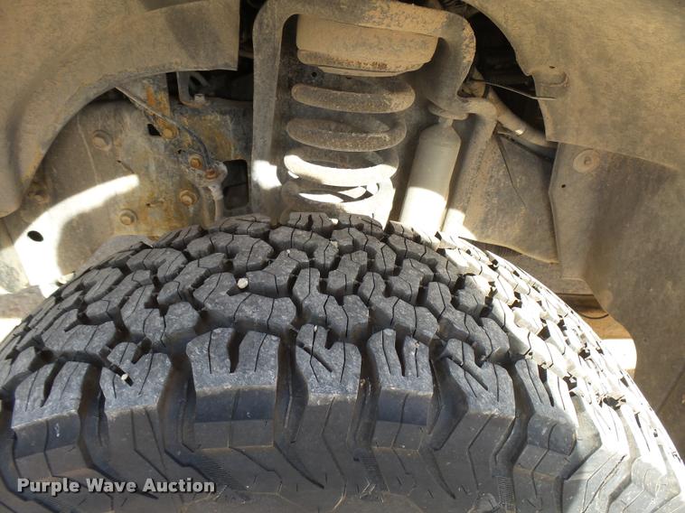 image for item DB2457 2008 Ford F350 Super Duty XL Crew Cab utility bed pickup truck